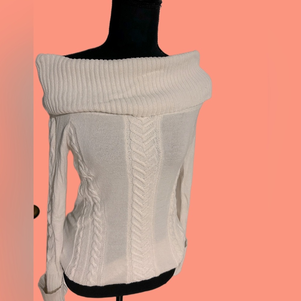 Beautiful Cream colored cable knit sweater lightly worn. Cuffed- BCBG